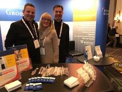 Minden Gross Tradeshow booth Minden Gross Tradeshow booth with Michael Horowitz, Christina Kobi, and Boris Zayachkowski